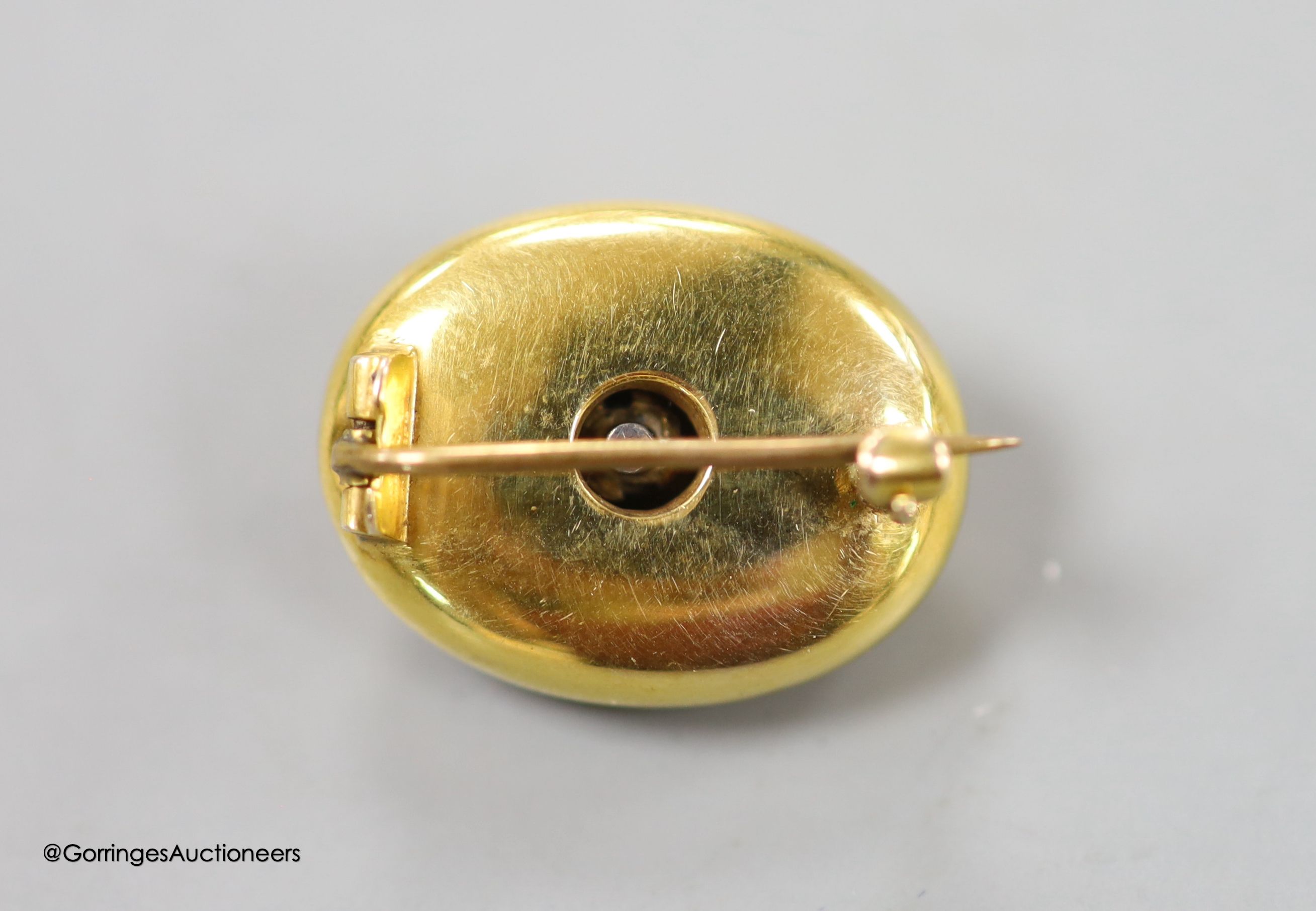 A Victorian yellow metal, oval and rose cut diamond set oval brooch, 21mm, gross weight 4.3 grams.